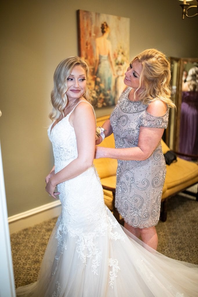 Bride and Her Mom Getting Ready for Wedding at The Cliffs at Glassy Chapel Wedding in South Carolina Wedding Photography and Videography by Lace and Honey Weddings