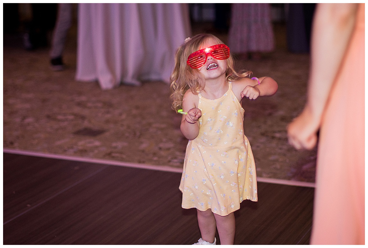 little girl with shutter shades