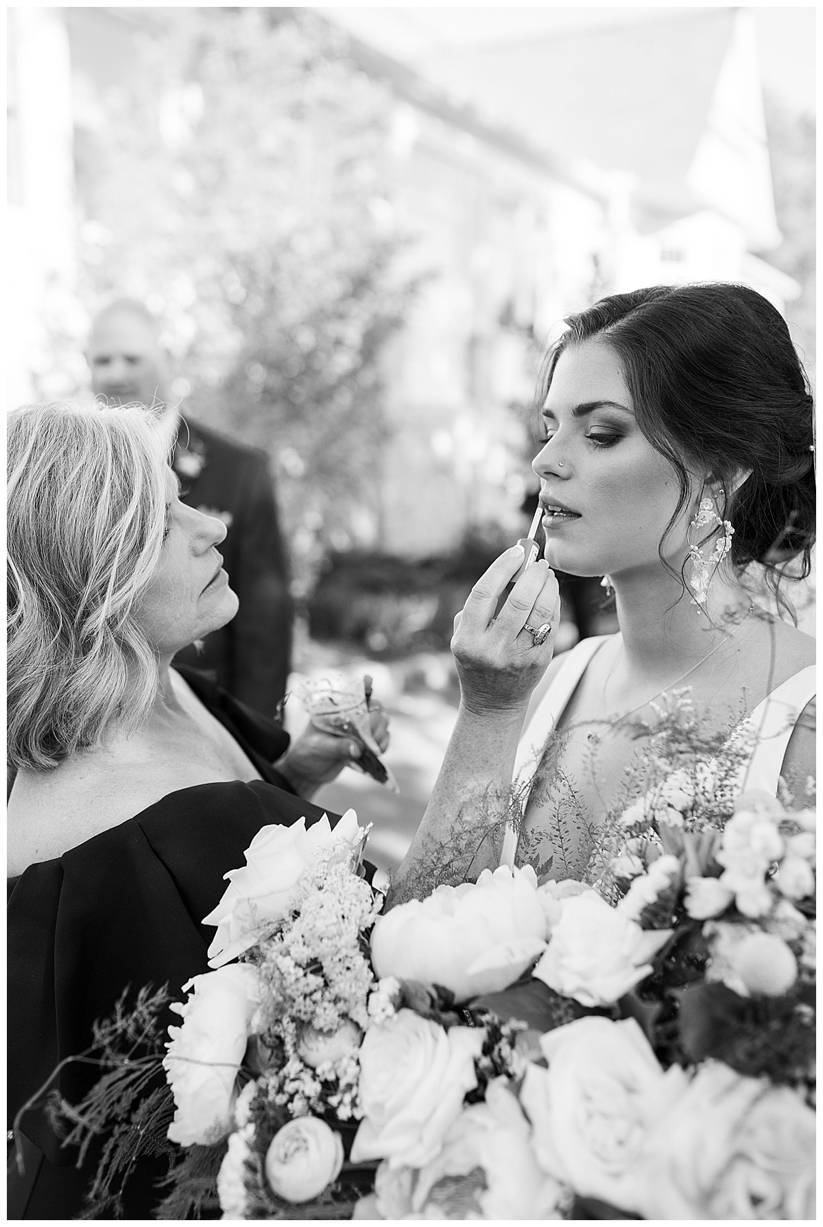 finishing touches on bride