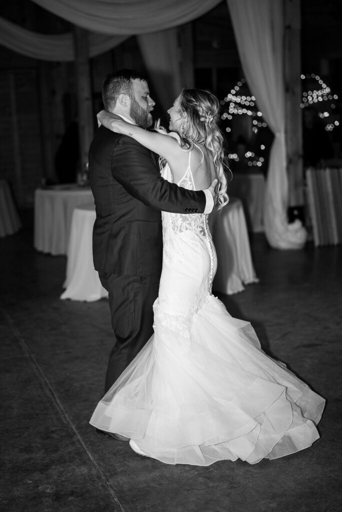 Whispers of Love: Bride and Groom's Last Dance, Wrapped in Each Other's Arms - A bittersweet moment, savoring the last notes of their wedding day