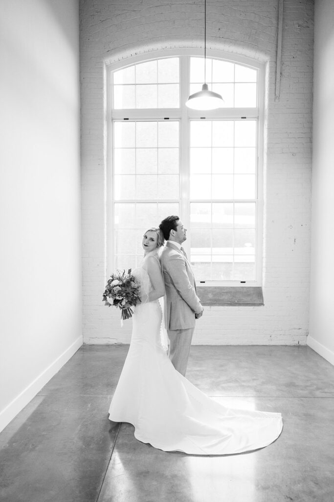 A magical wedding portrait that encapsulates the couple's overflowing love and happiness, highlighted by the beautiful, bright, and airy ambiance of Judson Mill.