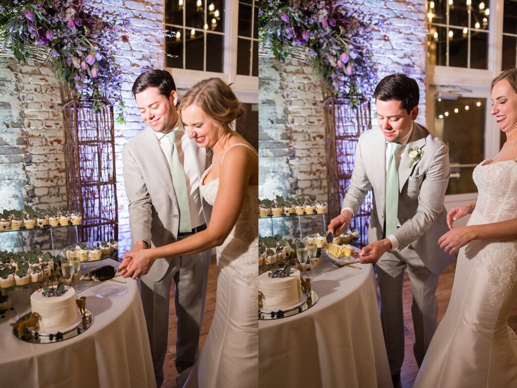 In a sweet gesture, the bride and groom exchange smiles as they cut into their beautifully decorated wedding cake, adding a touch of sweetness to their Judson Mill reception.