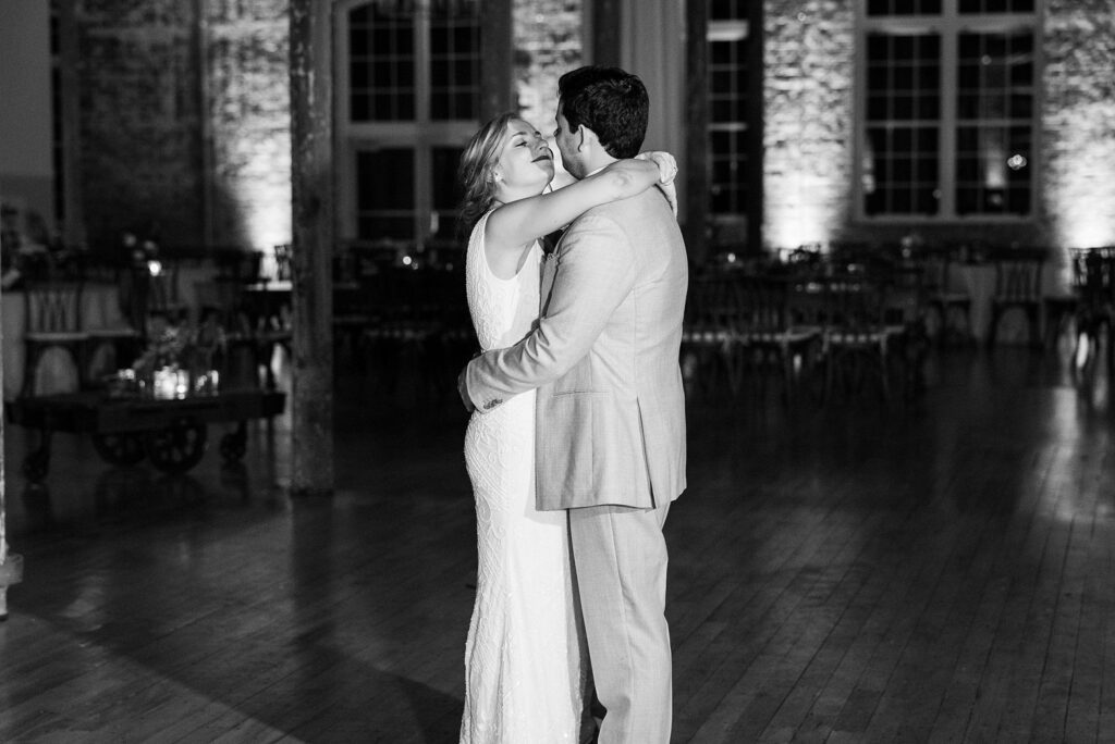 Intimate embrace between the bride and groom during their final dance at Greenville wedding