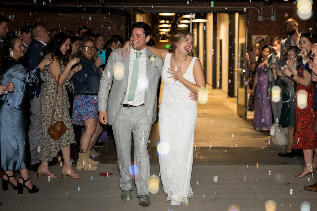 Romantic sparkler exit illuminating the night sky at Judson Mill wedding