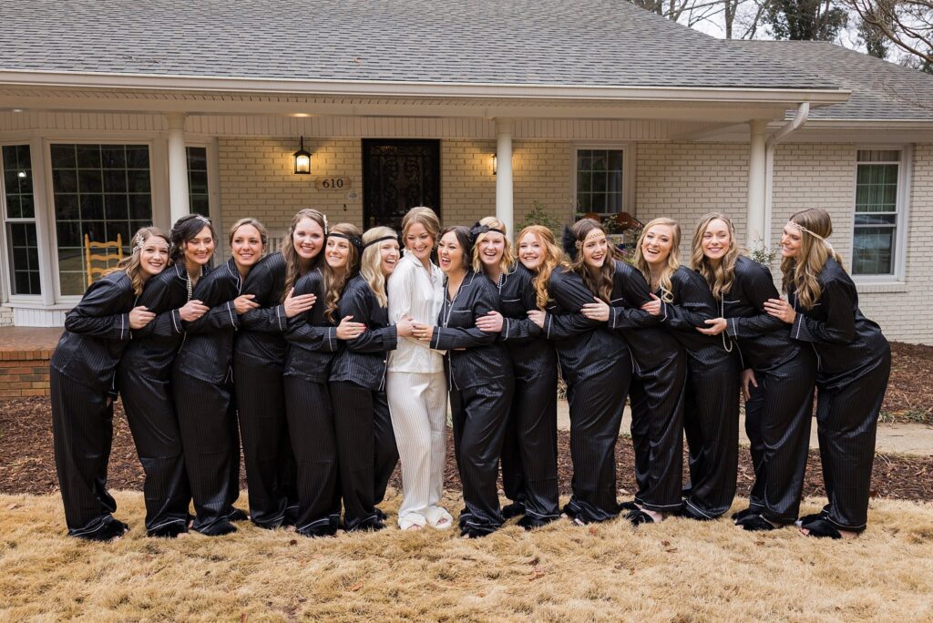 bridal party getting ready in pajamas with bride