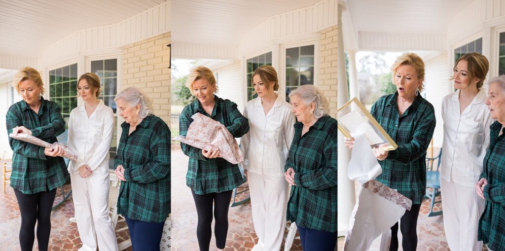Image of the bride, her mom, and grandma sharing tears of joy and love during the gift giving, beautifully captured by Lace + Honey