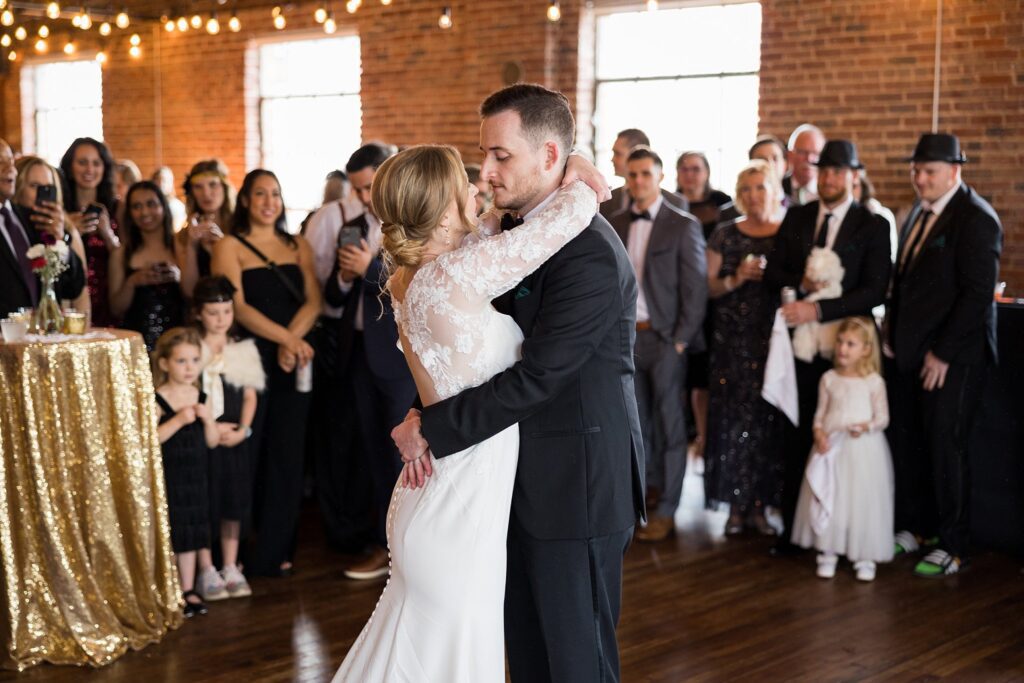 Lace + Honey's image of the bride and groom sharing their first dance in Greenville.