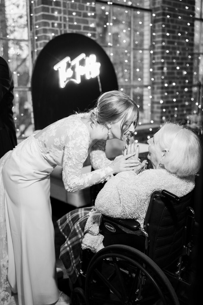 Image of emotional moment during mother's toast at Upper Room by Lace + Honey