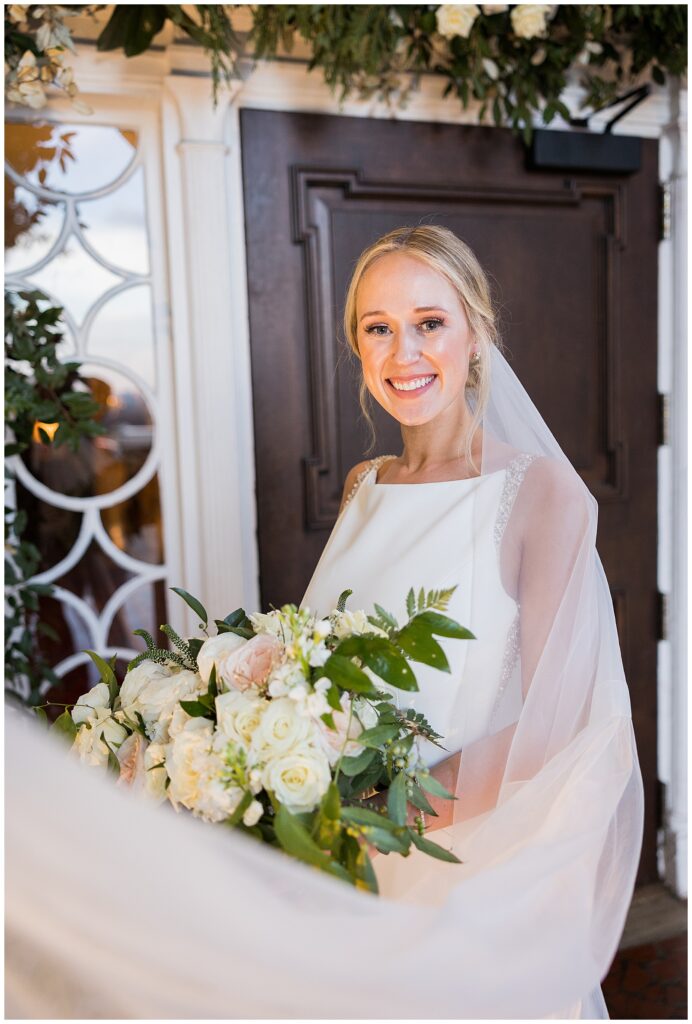 Bride's radiant smile in bridal portrait