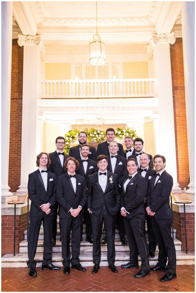 Groomsmen in black tuxes from The Black Tux