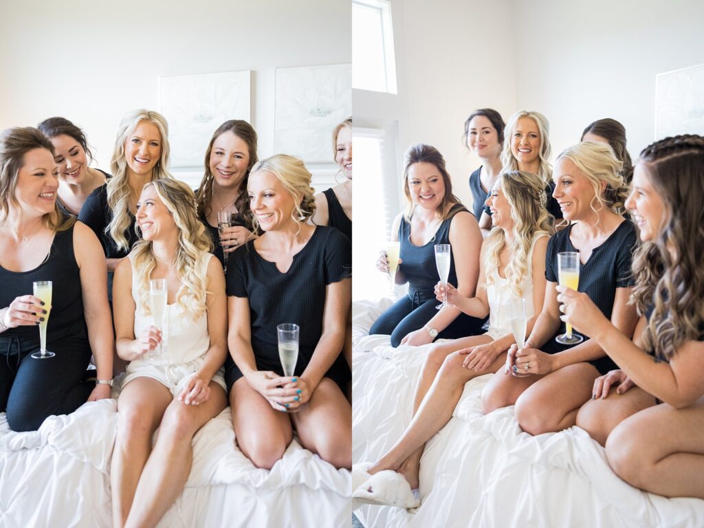 Lively bridal squad in cozy pajamas raising their champagne glasses at South Wind Ranch, Travelers Rest SC - A delightful scene of laughter and friendship as they cherish the pre-wedding bonding time