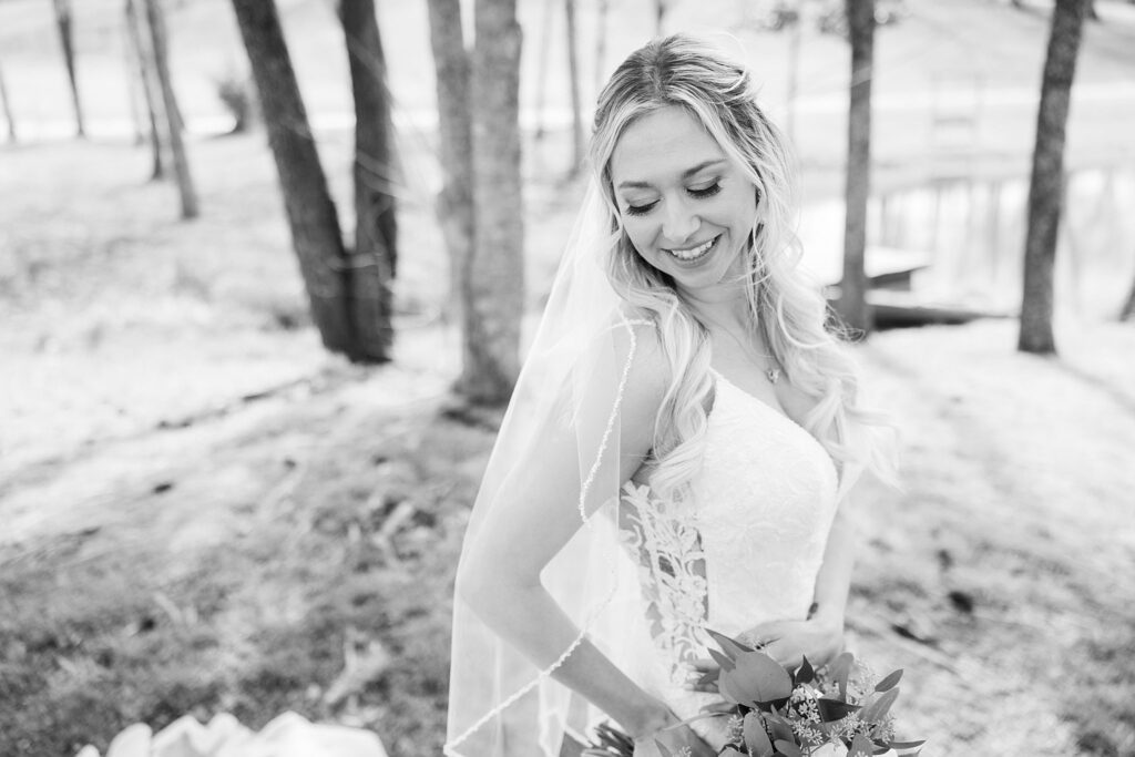 Sunny Serenity: Bridal Portrait at South Wind Ranch - The bride looking serene and composed in the natural setting
