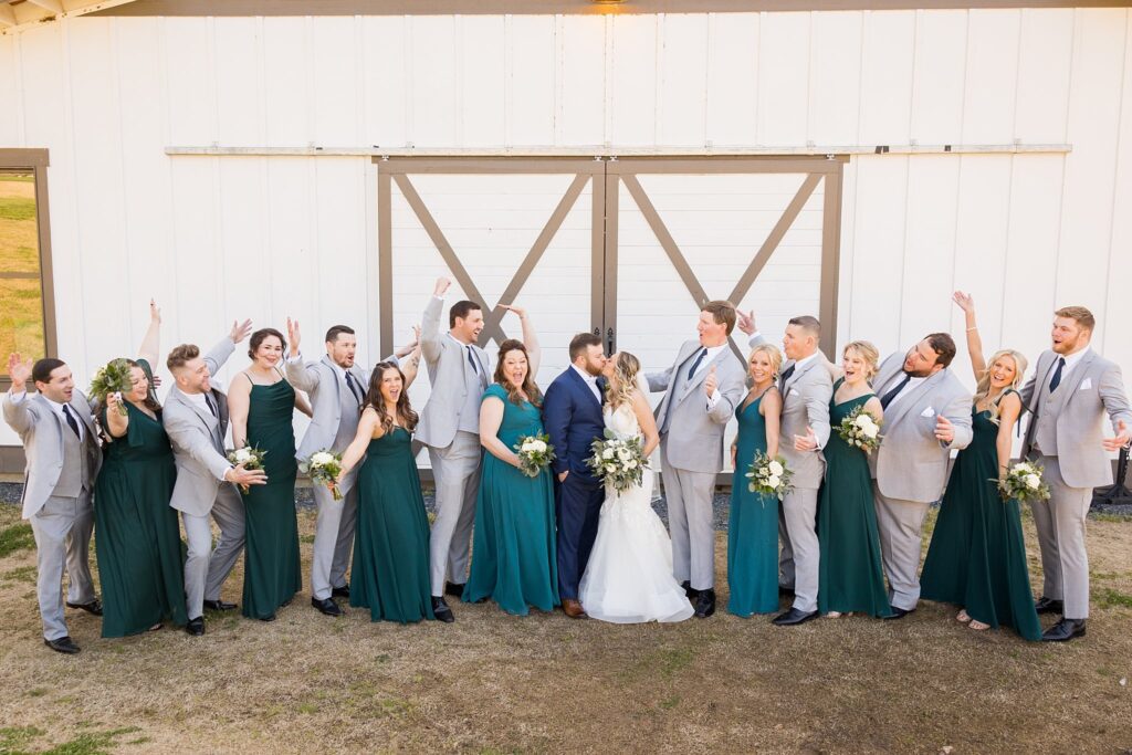 Bridal Squad: Bridesmaids and Groomsmen Together at South Wind Ranch - Supporting the couple with smiles and laughter.