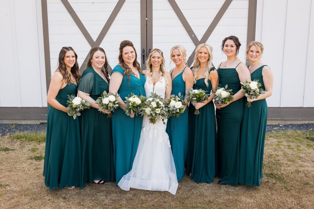 Bridesmaids' Bond: Radiant Smiles at South Wind Ranch - The bridesmaids exuding happiness and love for the bride