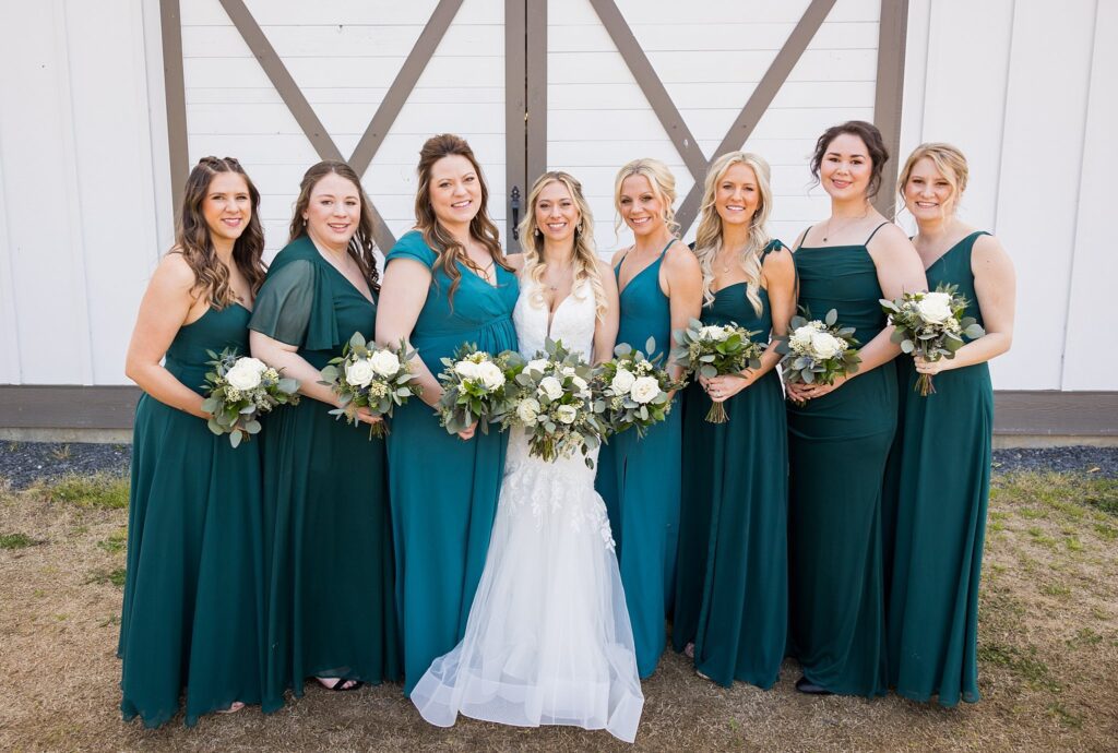 Supporting the Bride: Candid Moments of Bridesmaids at South Wind Ranch - Capturing the genuine camaraderie and laughter among the bridesmaids