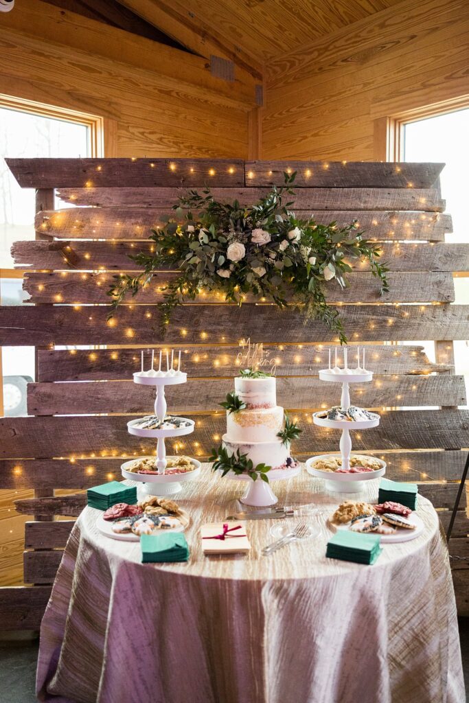 Sweet Confectionery: Cake Table at South Wind Ranch - A masterpiece in tiers, the wedding cake steals the show