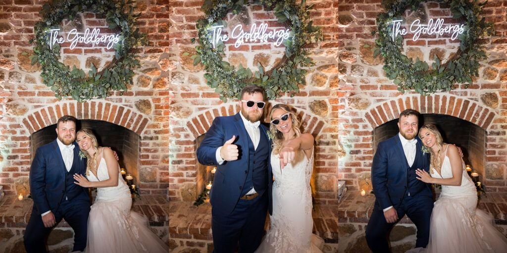 Seeing the World through Love: Bride and Groom Posed with Wedding-Branded Sunglasses at the Reception Headtable - Embracing a future filled with bright and joyful adventures