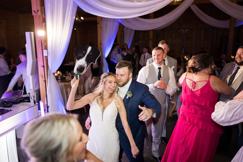 Dance Floor Bliss: A Memorable Wedding Party at South Wind Ranch - Guests, Bride, and Groom Grooving to the DJ's Beat